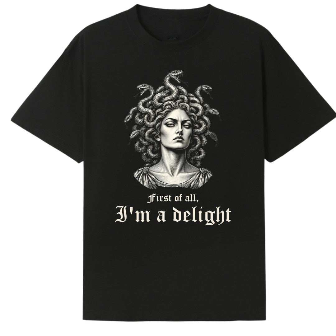 A black oversized tee with the First Of All I'm A Delight graphic printed large on the front.
