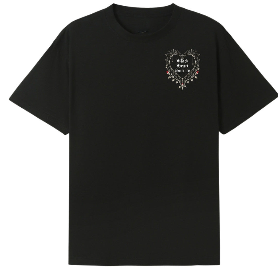 A black oversized tee with a small Black Heart Society graphic on the left chest.
