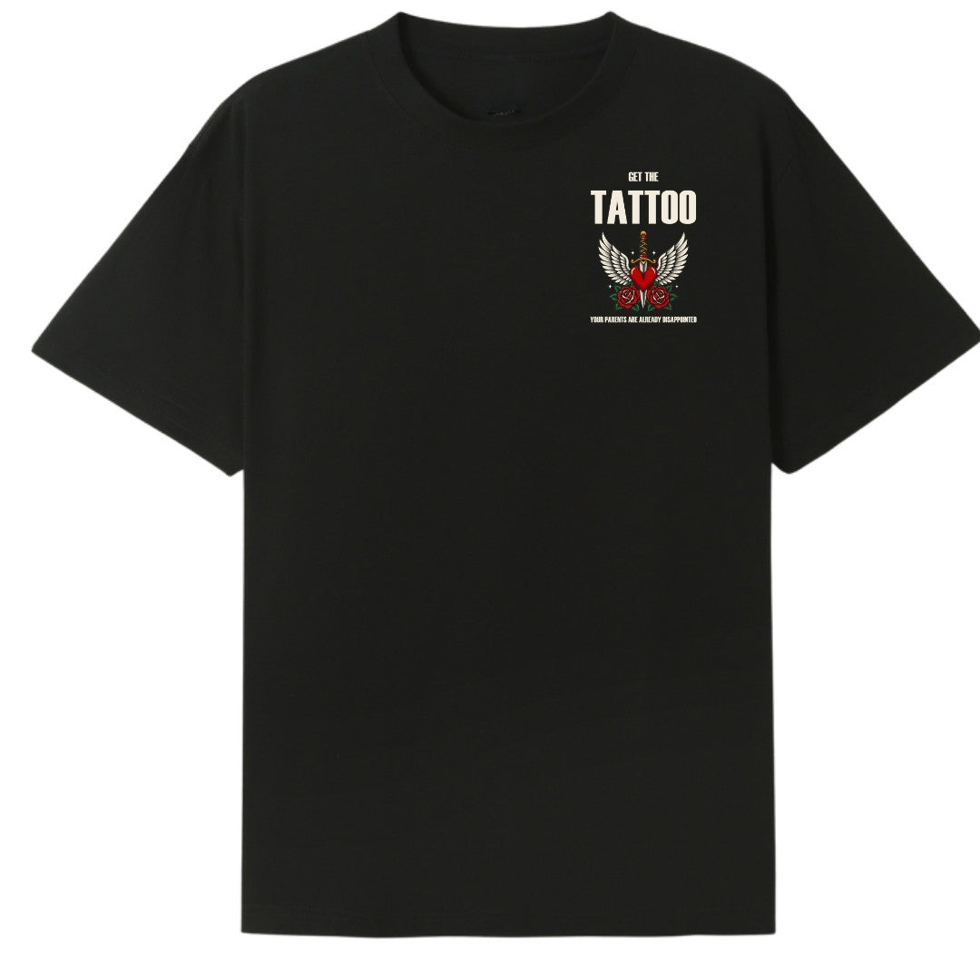 A black oversized tee with a small Get The Tattoo graphic on the left chest.