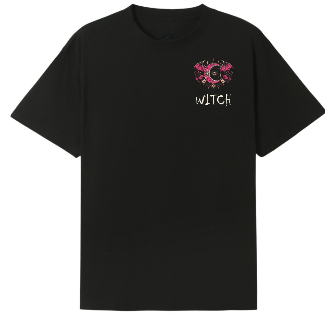 A black oversized tee with a small Witch graphic on the left chest.