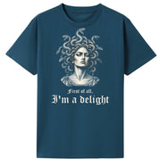 A teal oversized tee with the First Of All I'm A Delight graphic printed large on the front.