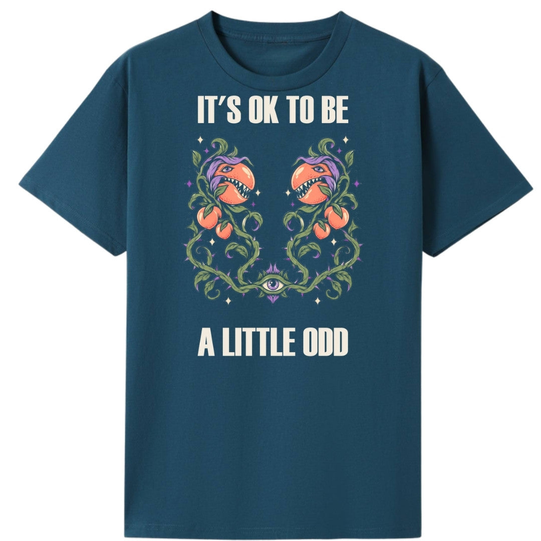 A teal oversized tee with the It's OK To Be A Little Odd graphic printed large on the front.