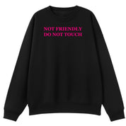 A black oversized crew neck with the Not Friendly Do Not Touch graphic printed large on the front.