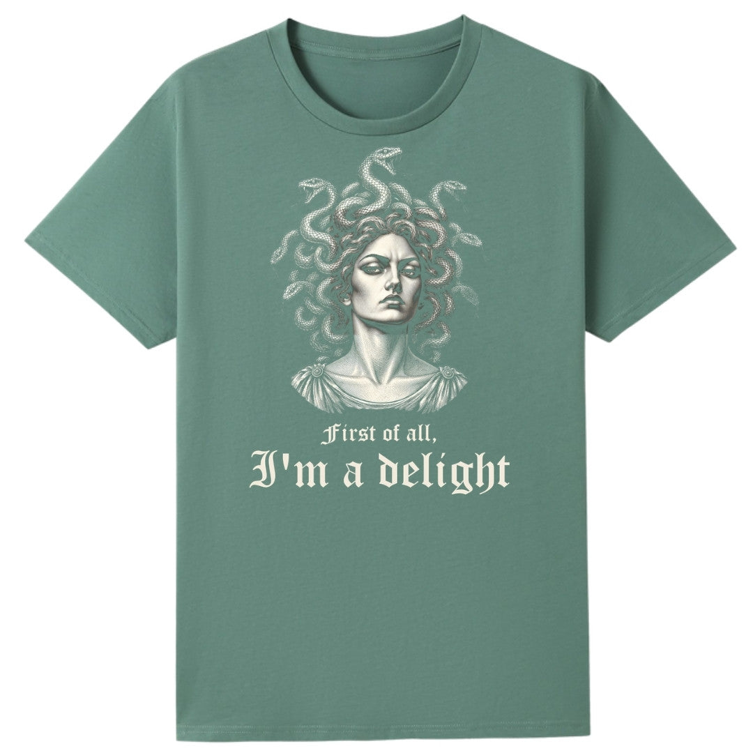 A slate green oversized tee with the First Of All I'm A Delight graphic printed large on the front.