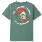 A slate green oversized tee shown from the back, with the Slightly Emotionally Damaged graphic printed large across the back.