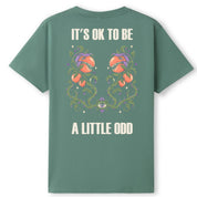 A slate green oversized tee shown from the back, with the It's OK To Be A Little Odd graphic printed large across the back.