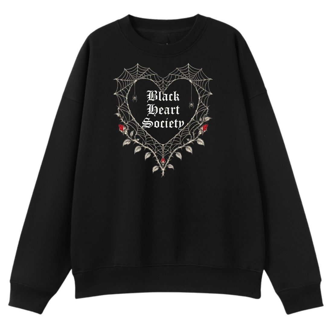 A black oversized crew neck with the Black Heart Society graphic printed large on the front.