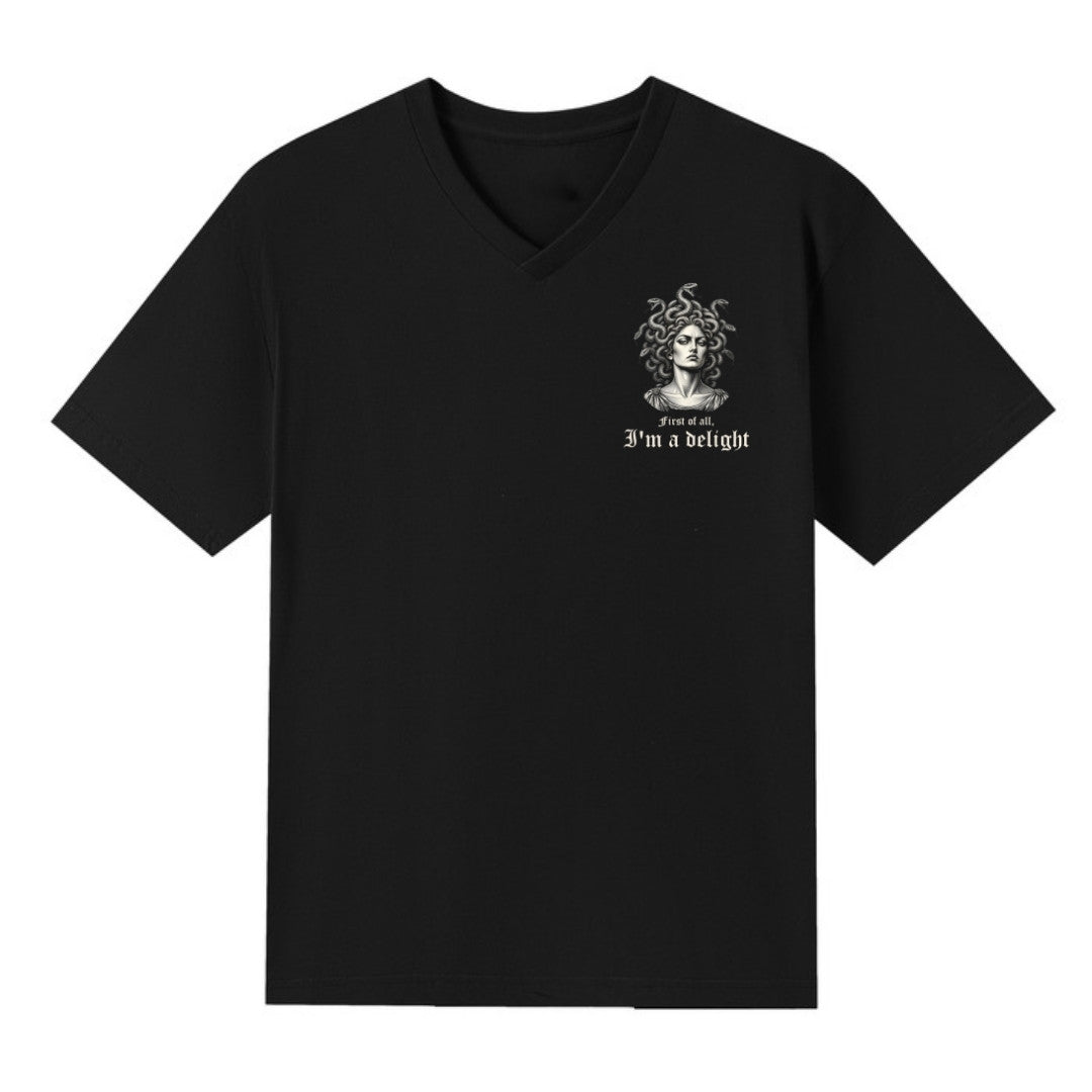 A black V-neck oversized tee with a small First Of All I'm A Delight graphic on the left chest.