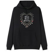 A black oversized hoodie with the Black Heart Society graphic printed large on the front.