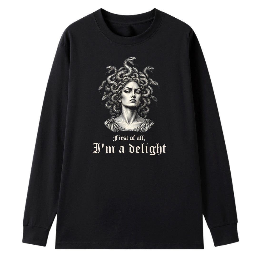 A black oversized long sleeve tee with the First Of All I'm A Delight graphic printed large on the front.