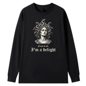 A black oversized long sleeve tee with the First Of All I'm A Delight graphic printed large on the front.