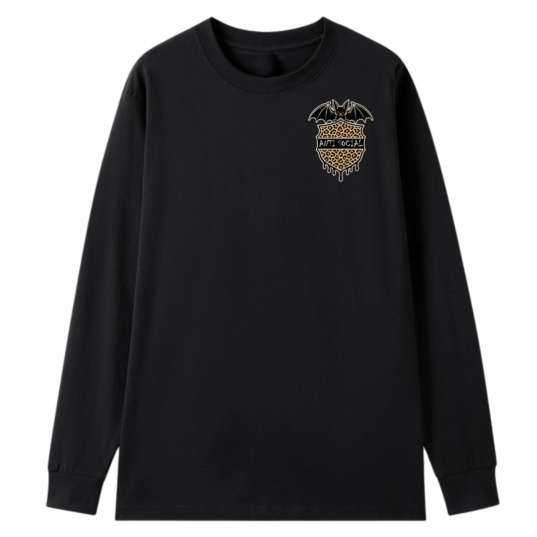 A black oversized long sleeve tee with a small Anti Social graphic on the left chest.
