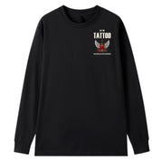 A black oversized long sleeve tee with a small Get The Tattoo graphic on the left chest.