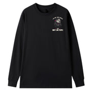 A black oversized long sleeve tee with a small I'm Not Anti Social Bulldog graphic on the left chest.