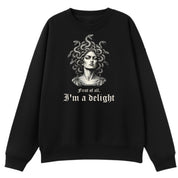 A black oversized crew neck with the First Of All I'm A Delight graphic printed large on the front.