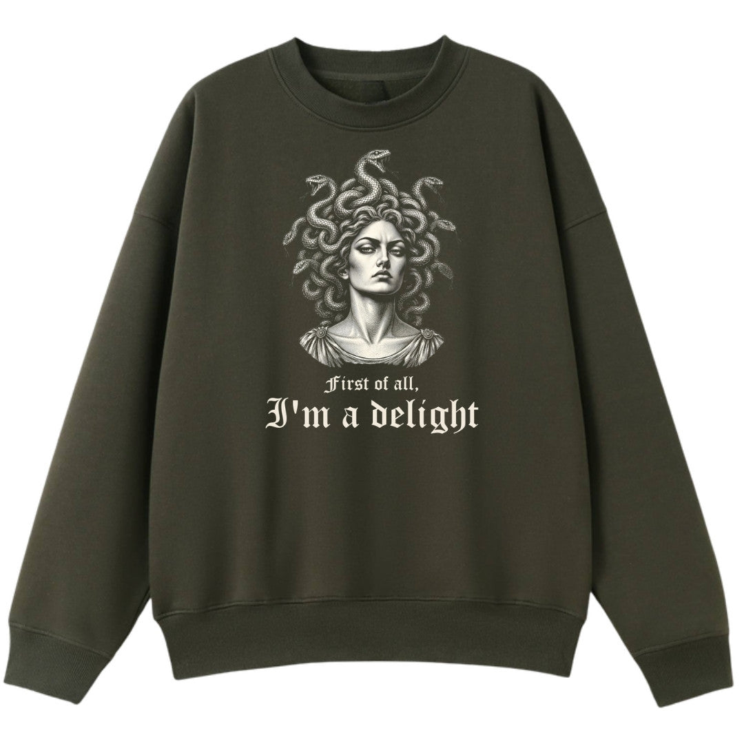 A army green oversized crew neck with the First Of All I'm A Delight graphic printed large on the front.