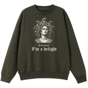 A army green oversized crew neck with the First Of All I'm A Delight graphic printed large on the front.