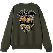 A army green oversized crew neck shown from the back, with the Anti Social graphic printed large across the back.