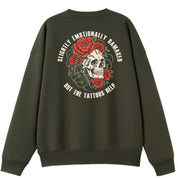 A army green oversized crew neck shown from the back, with the Slightly Emotionally Damaged graphic printed large across the back.