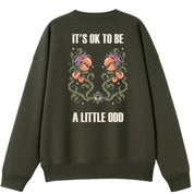 A army green oversized crew neck shown from the back, with the It's OK To Be A Little Odd graphic printed large across the back.