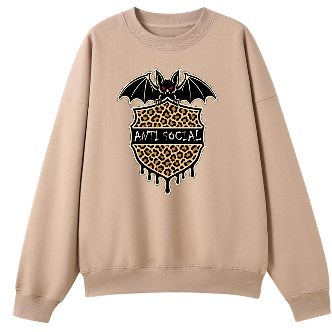 A peach oversized crew neck with the Anti Social graphic printed large on the front.