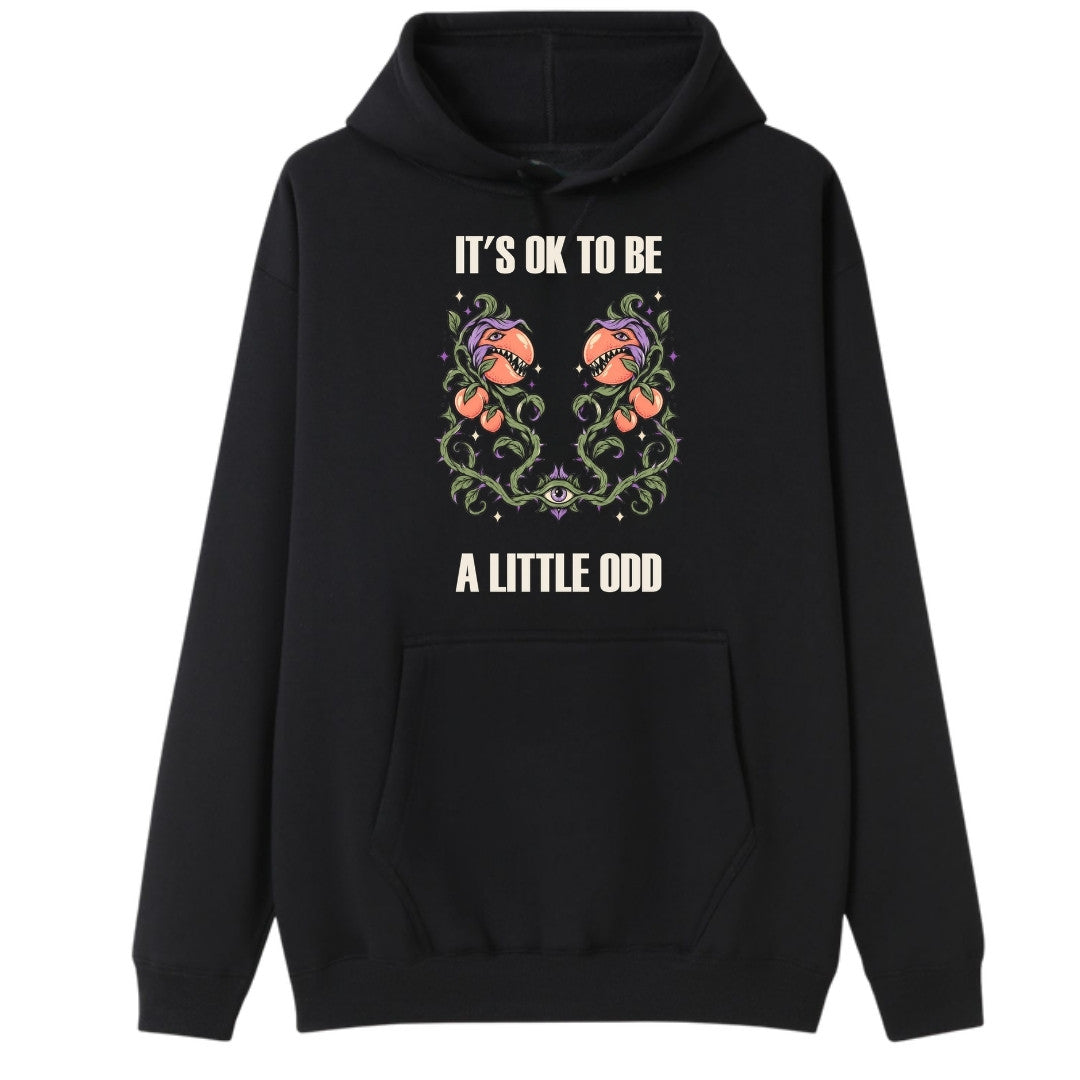 A black oversized hoodie with the It's OK To Be A Little Odd graphic printed large on the front.