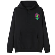 A black oversized hoodie with a small Medusa graphic on the left chest.