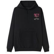 A black oversized hoodie with a small Witch graphic on the left chest.
