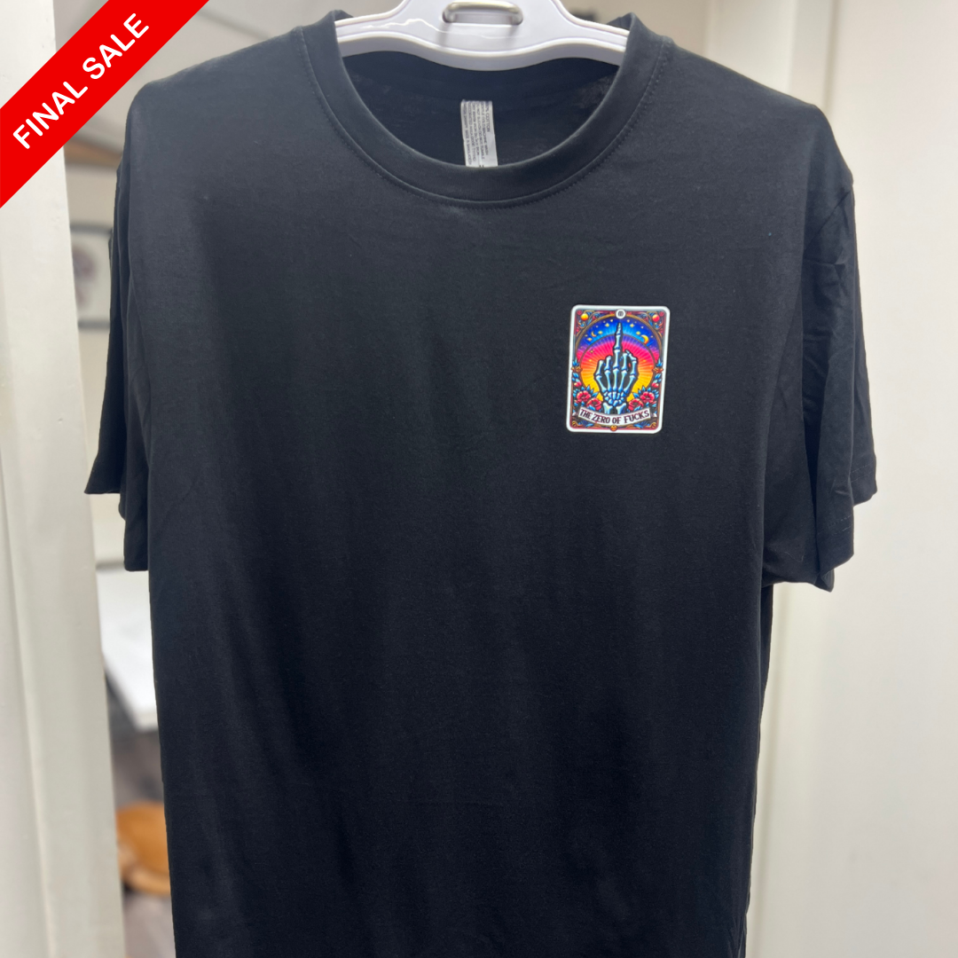 Black t-shirt with a colorful patch on a hanger against a white background