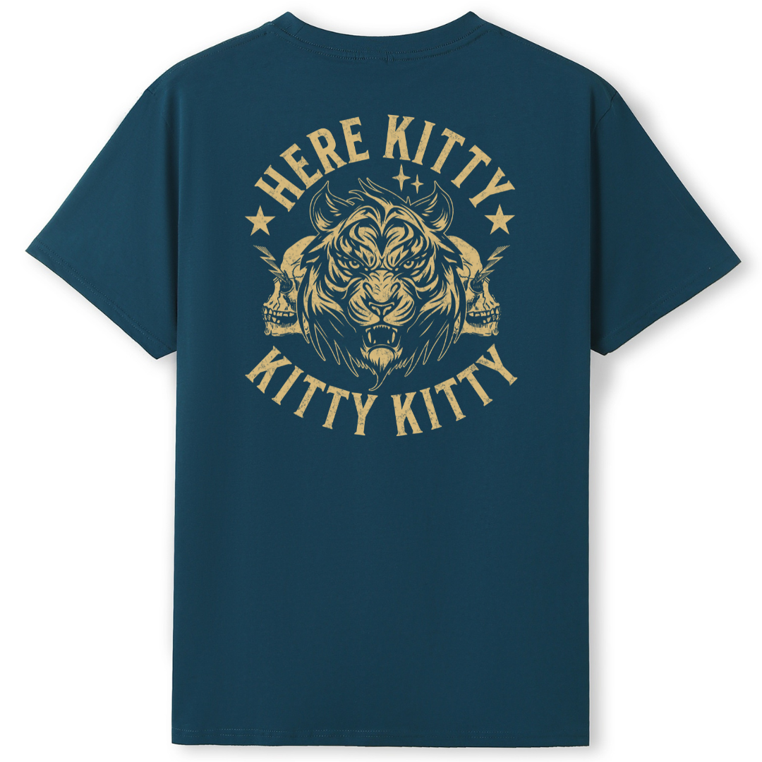 A dark teal blue short-sleeve t-shirt with a large gold graphic on the back. The graphic features a stylized tiger head with horns, flanked by two skulls, and the words 'HERE KITTY KITTY' in a distressed font.