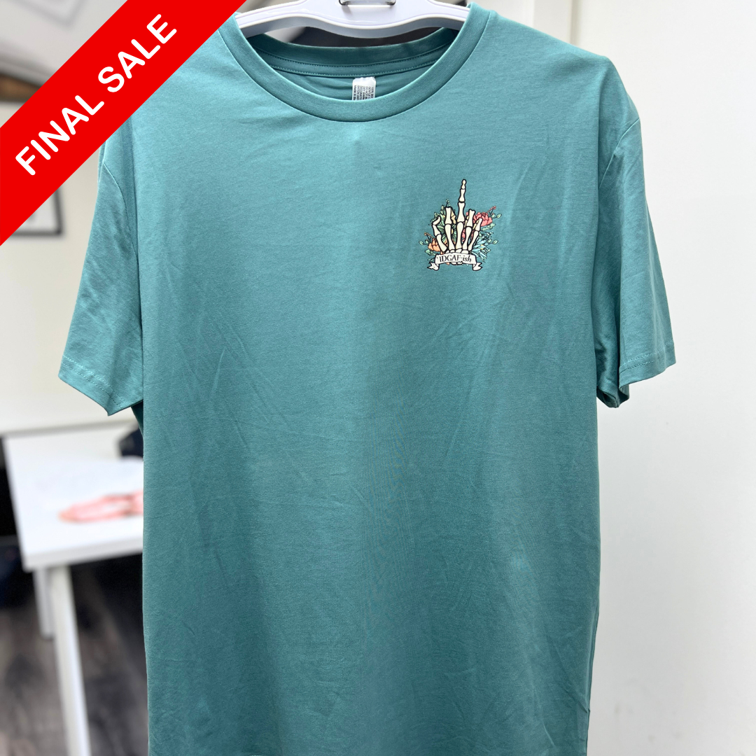 Teal t-shirt with a small graphic on a hanger against a white background