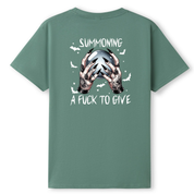 A sage green short-sleeve t-shirt shown from the back, featuring a graphic of tattooed hands holding a silver skull with the text 'SUMMONING' above and 'A FUCK TO GIVE' below.