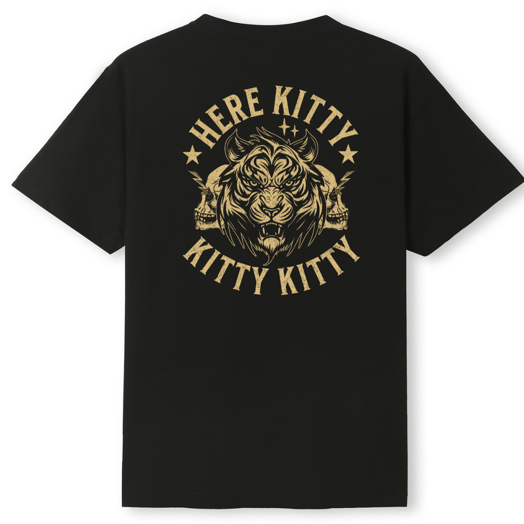 A black short-sleeve t-shirt with a large distressed gold graphic on the back featuring a roaring tiger, two skulls, and the text 'HERE KITTY KITTY'.