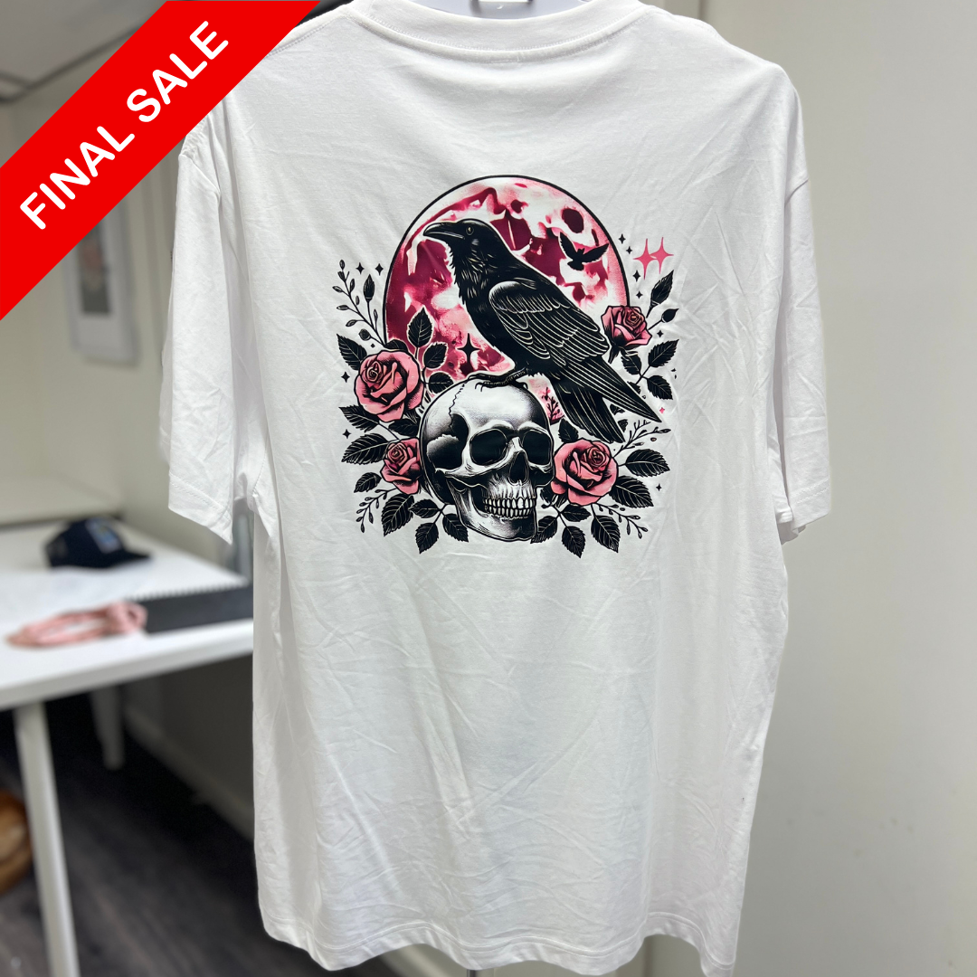 White t-shirt with skull and crow design on a white background