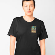 Person wearing a black t-shirt with a colorful graphic on a plain background