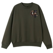 An olive green crewneck sweatshirt with a small graphic print of two cartoon characters on the left chest, displayed against a solid white background.