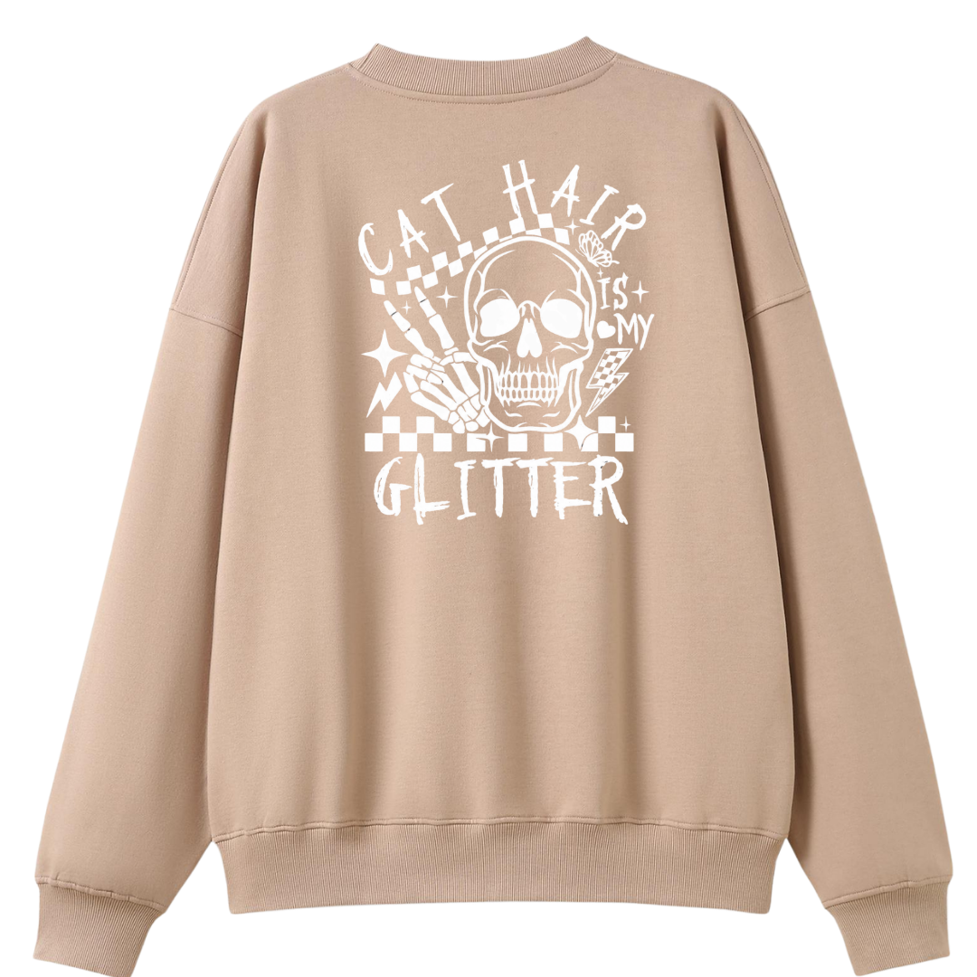 Beige sweatshirt with a skull design and text on the back against a white background