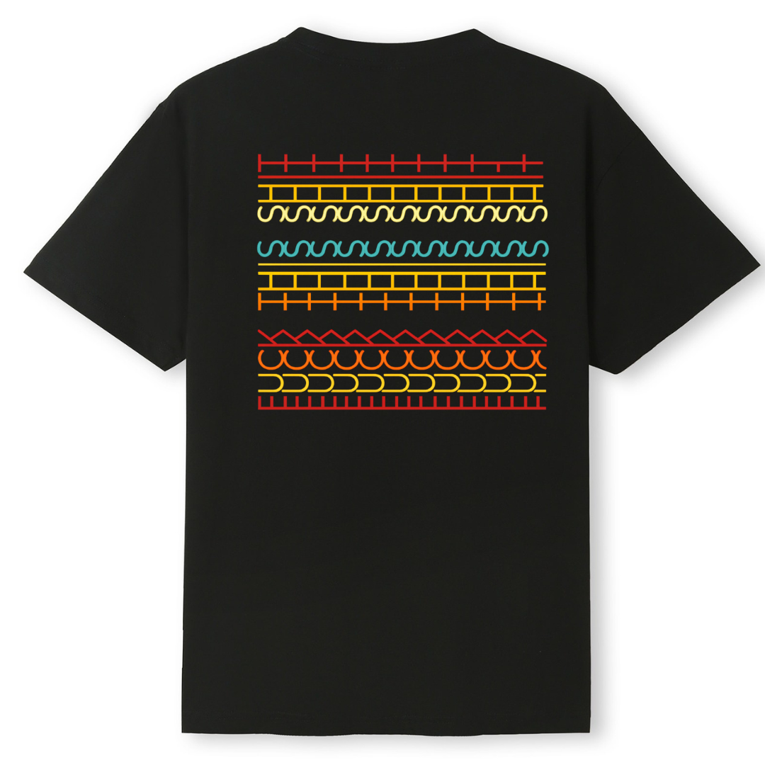 Black t-shirt with colorful geometric pattern on the back against a white background