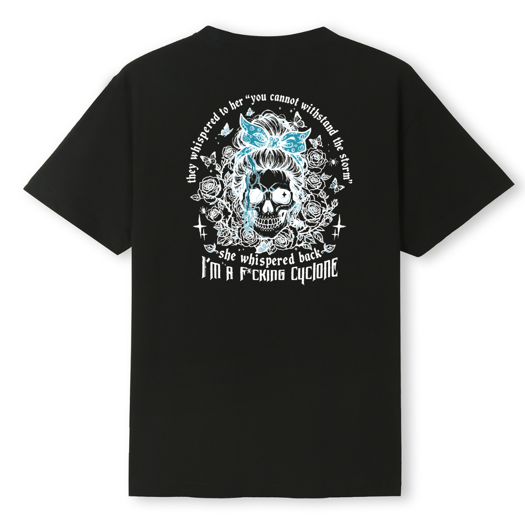 Black t-shirt with a skull and floral design on the back, featuring text.