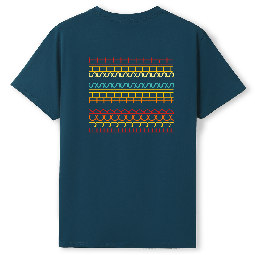 Navy blue t-shirt with colorful geometric pattern on the back against a white background