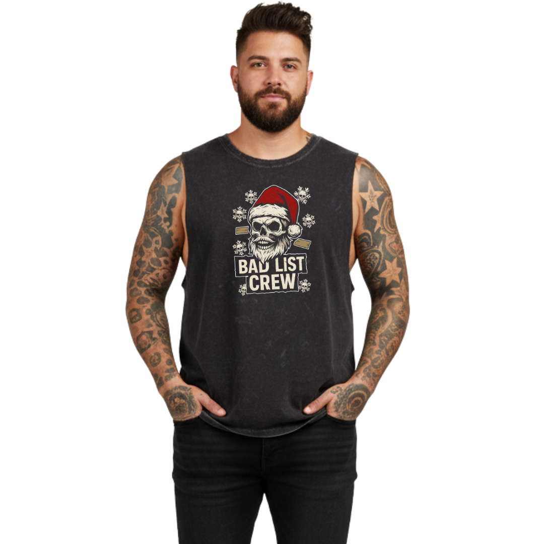 Man wearing a black sleeveless shirt with a graphic design on a white background