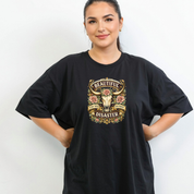 Woman wearing a black t-shirt with a graphic design on a white background