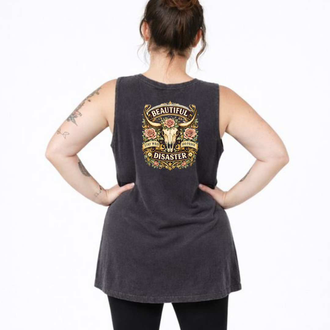 Person wearing a black sleeveless shirt with a graphic design on the back, standing against a white background.