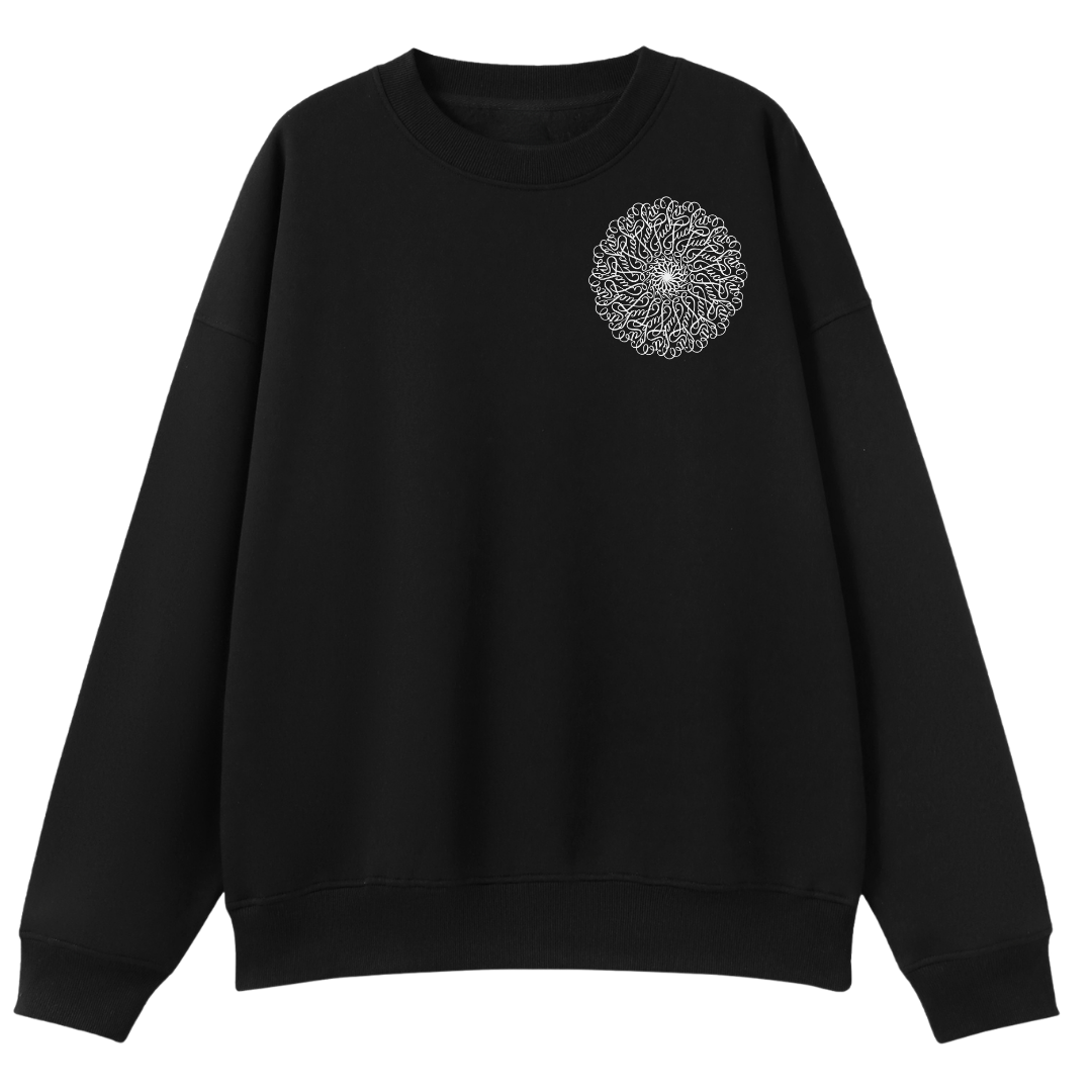 A black crewneck sweatshirt with a white mandala graphic printed on the left chest, displayed against a solid white background.
