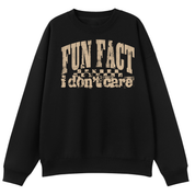 A black crewneck sweatshirt with a distressed beige graphic on the front that reads 'FUN FACT i don't care' over a small checkerboard pattern, shown against a plain white background.