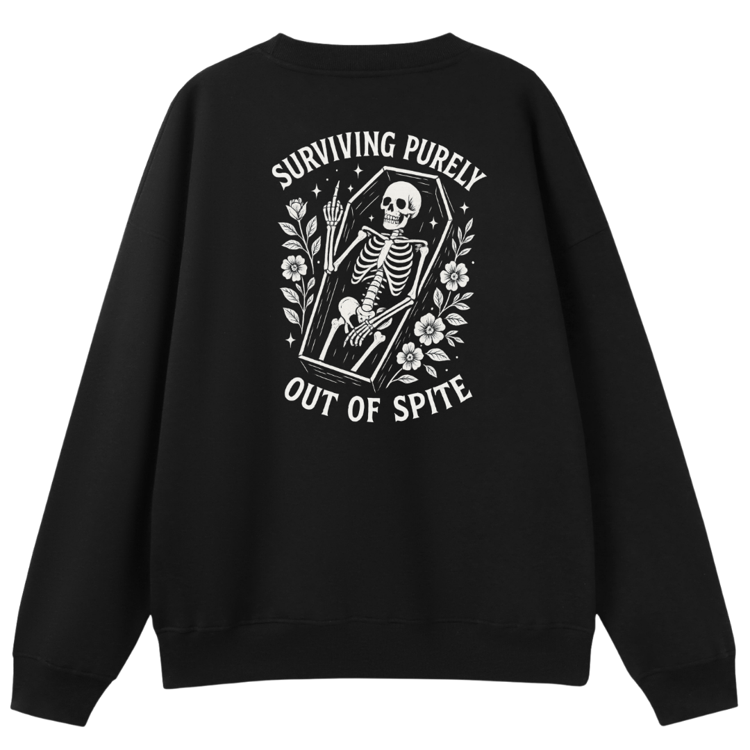 A black crewneck sweatshirt shown from the back, featuring a large white graphic print of a skeleton sitting in a coffin with the text 'SURVIVING PURELY OUT OF SPITE' and floral details.