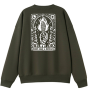 An olive green crewneck sweatshirt shown from the back, featuring a large white graphic print on the back with a hand holding a burning book and the text 'BURNS SAGE & BRIDGES'.