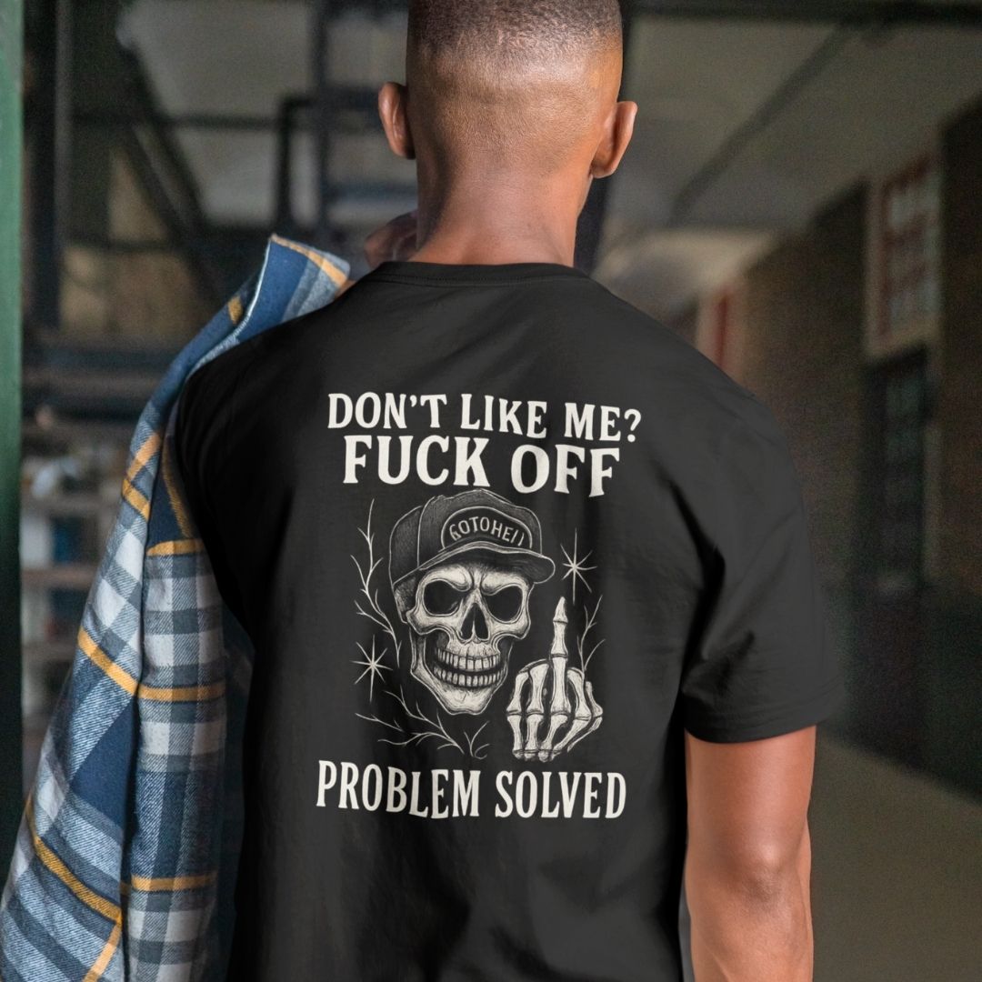 Man wearing a black t-shirt with a graphic design and text on the back.