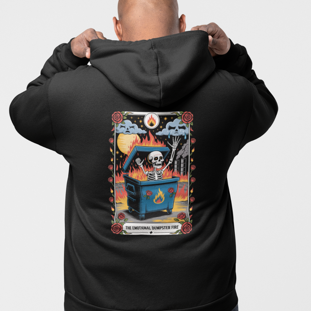 Person wearing a black hoodie with a graphic design on the back, featuring a skeleton and flames.