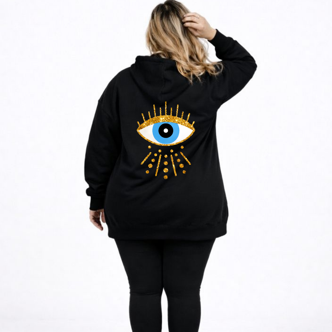 Black hoodie with an eye design on the back worn by a person against a white background